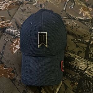 Tiger Woods Collection Fitted Hat size large to xl comes with golf ball marker..